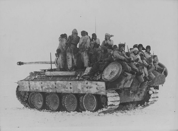 A Panther Ausf.A transports troops as part of a Kampfgruppen 1944, Alsace-Lorraine, France